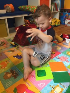 Creating a large Magna Tile triangle on his own